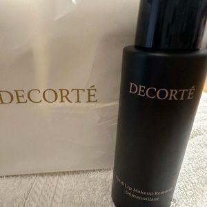 Decorte Eye & Lip Makeup Remover and sealed package of cotton pads